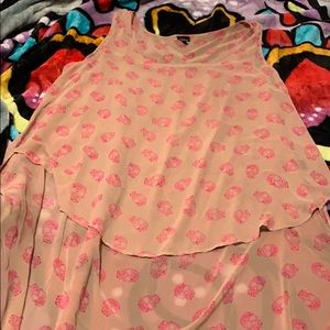 Skull print sleeveless high low blouse